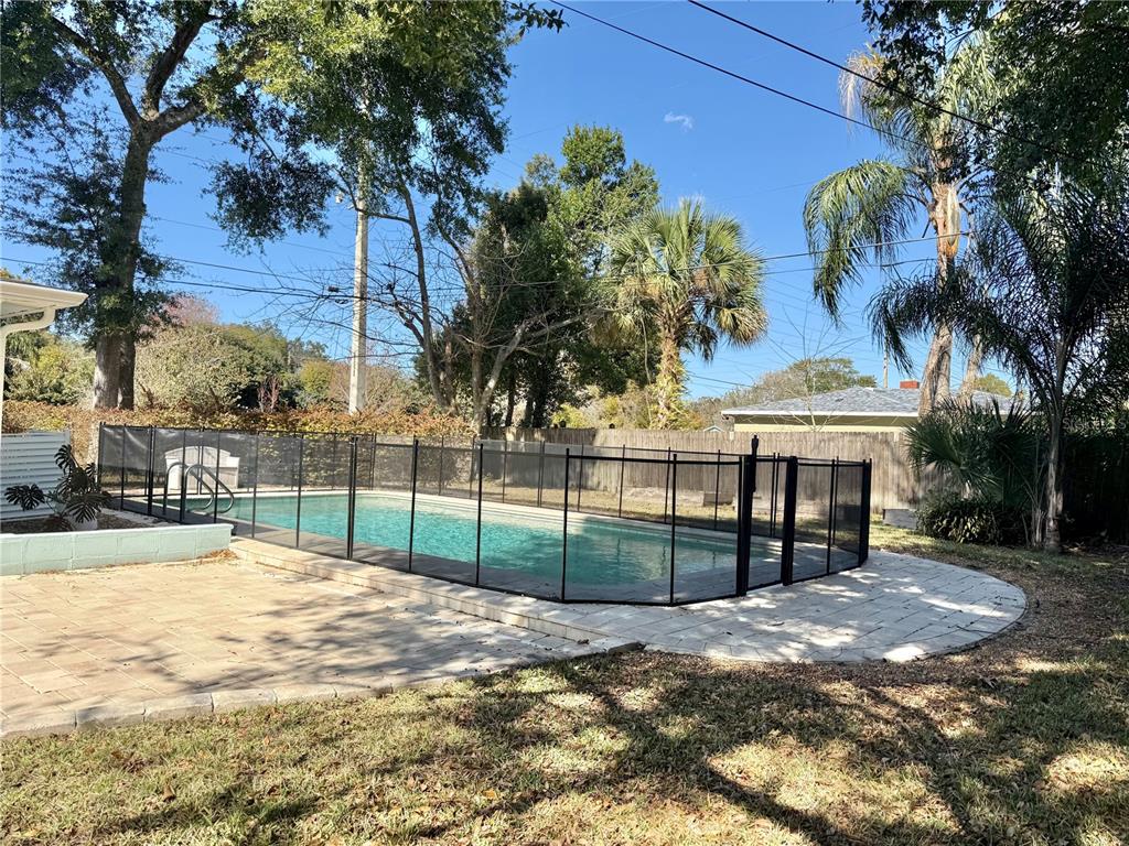 2801 Nancy Street Orlando, FL 32806 - Photo 26 of 39 a view of a backyard with large trees