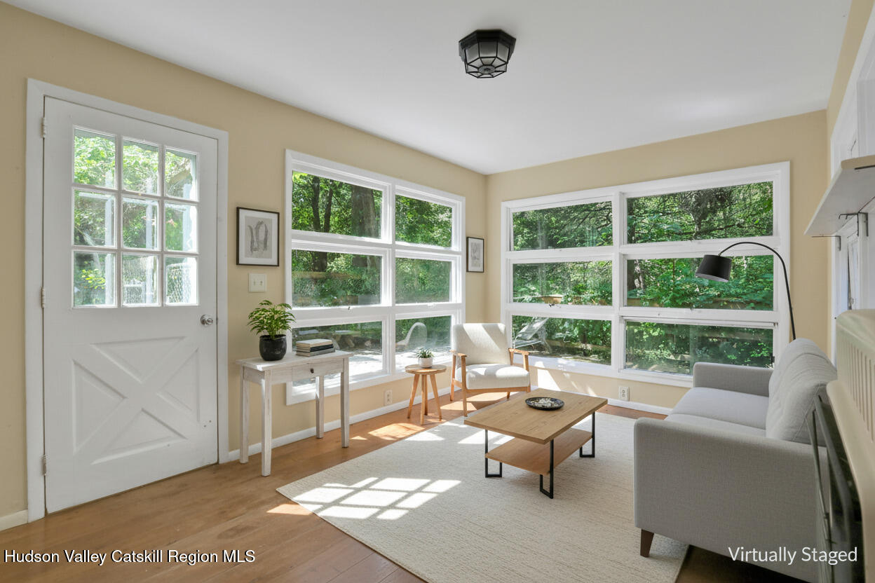 197 Old Rte 32 Saugerties, NY 12477 - Photo 13 of 31 a living room with furniture and a large window