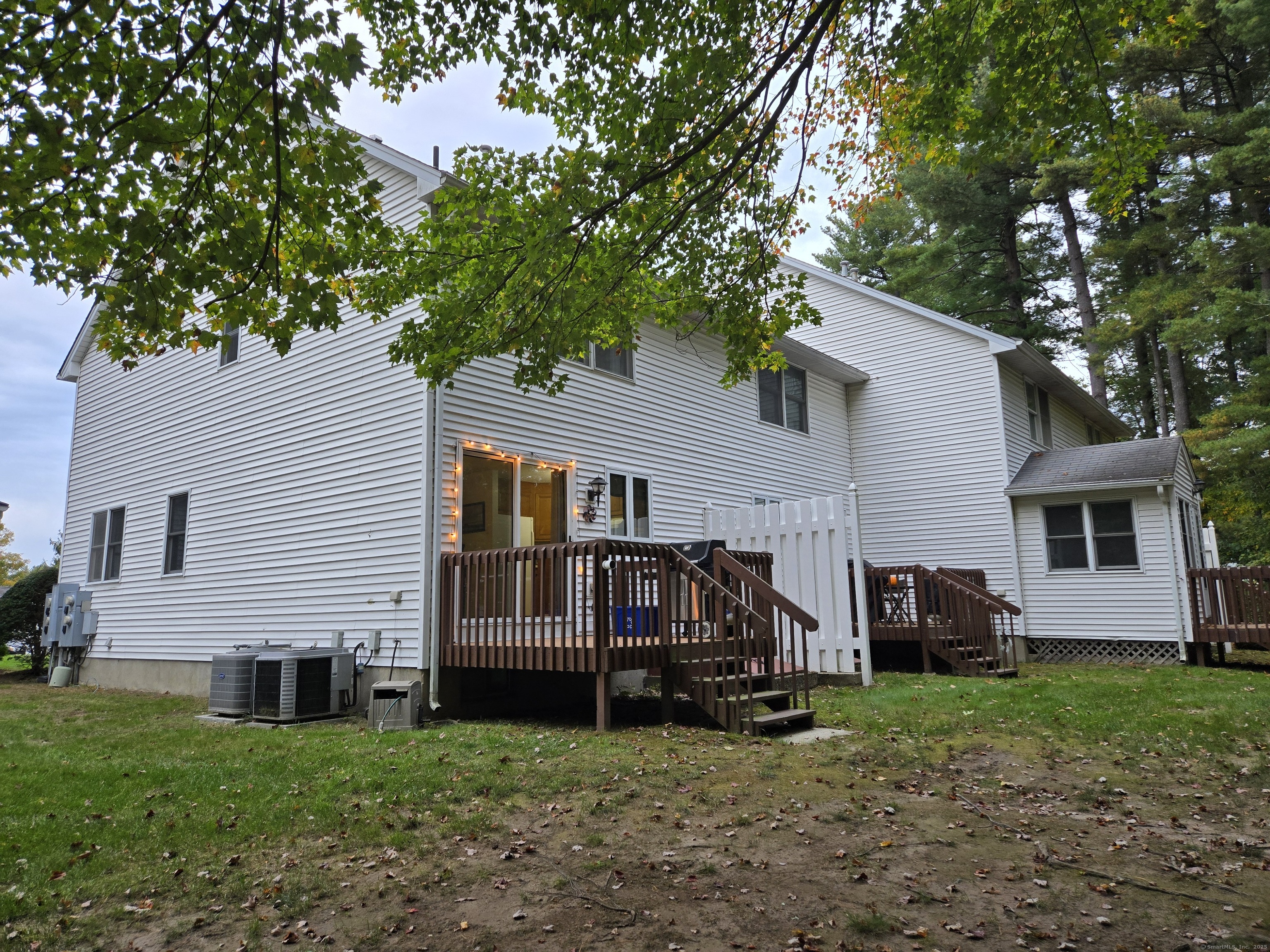 85 Oldefield Farms, Unit 85 Enfield, CT 06082 - Photo 32 of 36 a view of a house with a yard