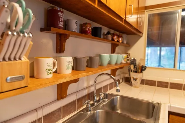 a vase of flowers sitting on a table
