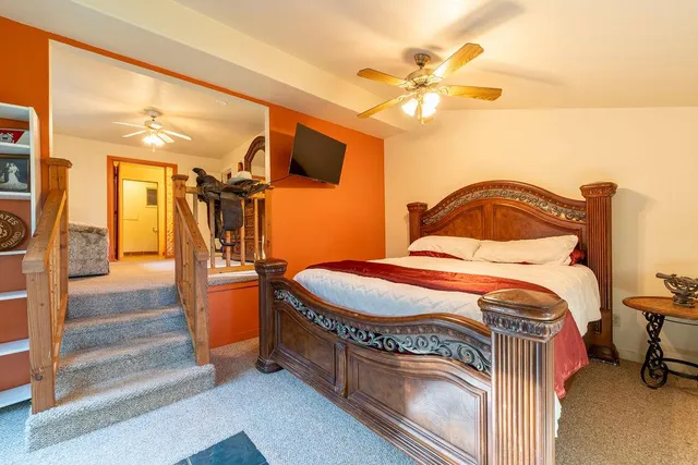 a kitchen with stainless steel appliances granite countertop wooden cabinets a sink and dishwasher