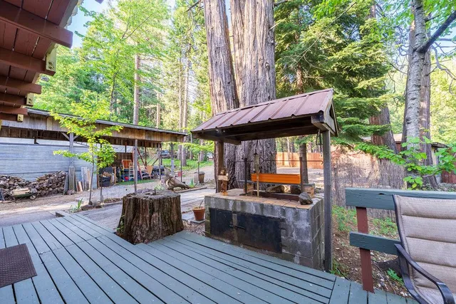 a living room with furniture a window and a fireplace