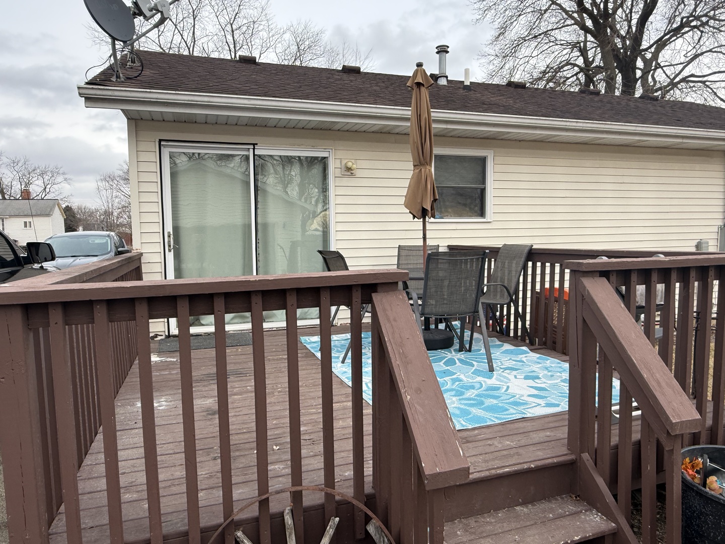 206 South 12th Street Rochelle, IL 61068 - Photo 14 of 14 a view of balcony with wooden deck and furniture
