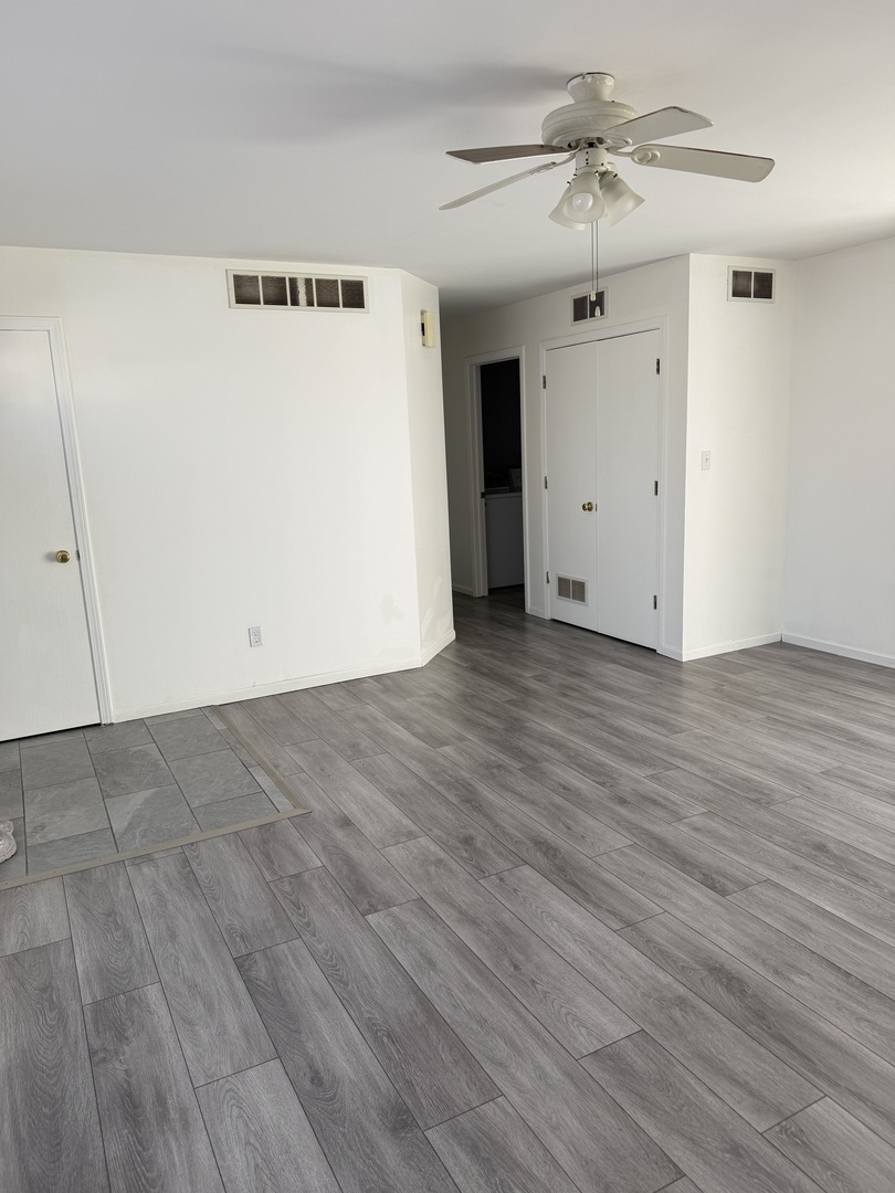 206 South 12th Street Rochelle, IL 61068 - Photo 2 of 14 a view of a big room with wooden floor