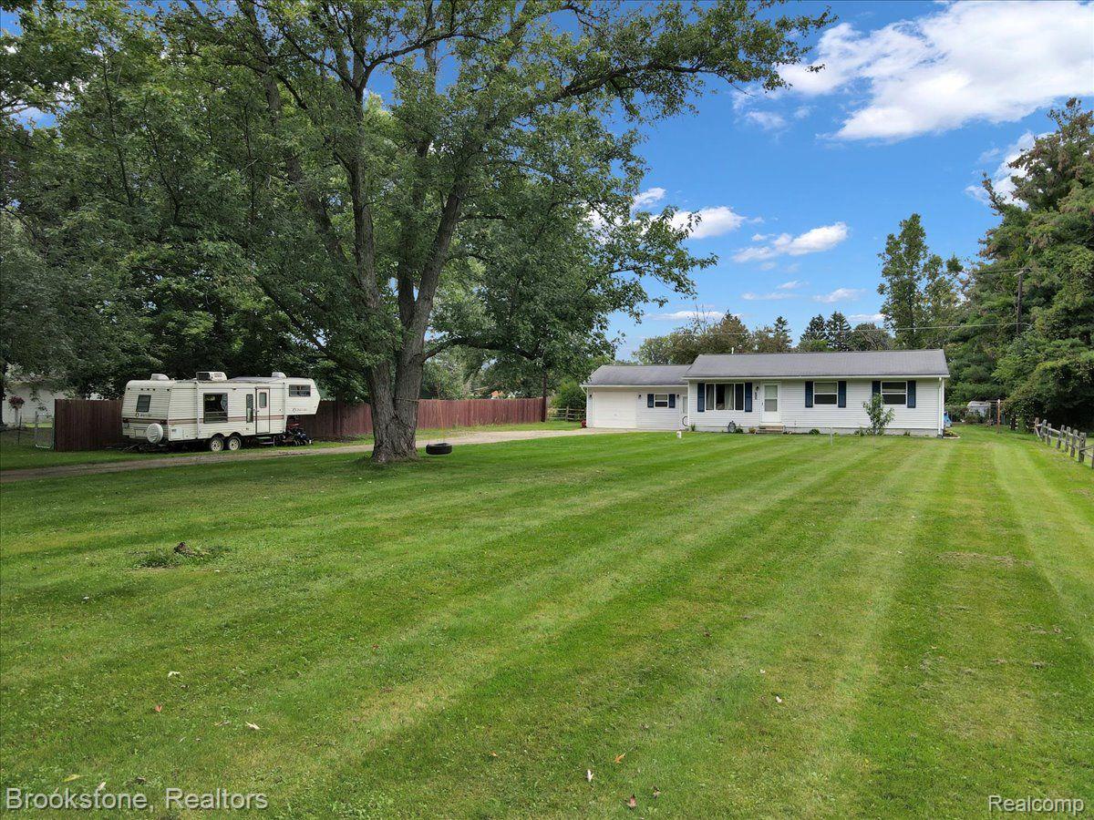 3664 West Genesee Road Lapeer, MI 48446 - Photo 9 of 32 Perfectly situated in the middle of the property!