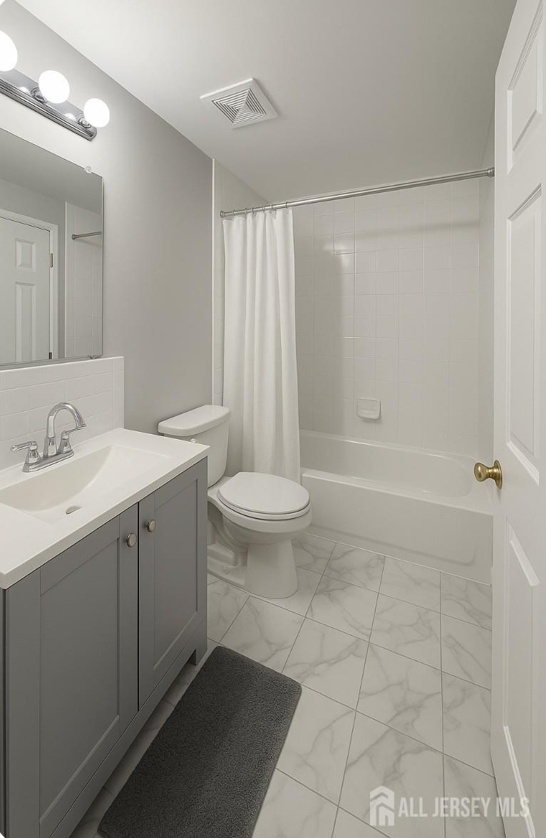 340 Bowler Court Piscataway, NJ 08854 - Photo 3 of 16 a bathroom with a sink a toilet and shower