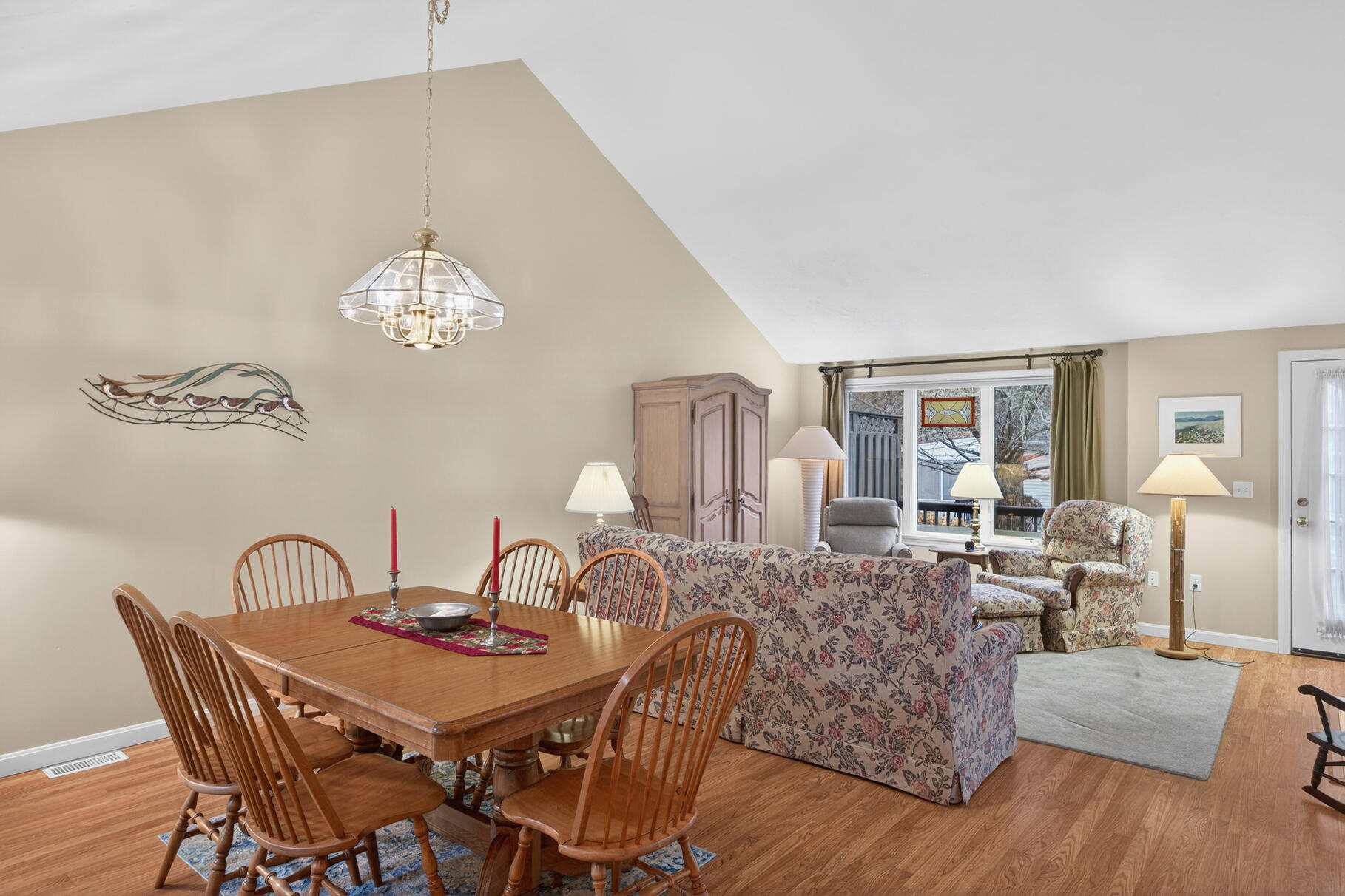 18 Windward Street, Unit 18 Mashpee, MA 02649 - Photo 12 of 34 a view of a dining room with furniture window and wooden floor