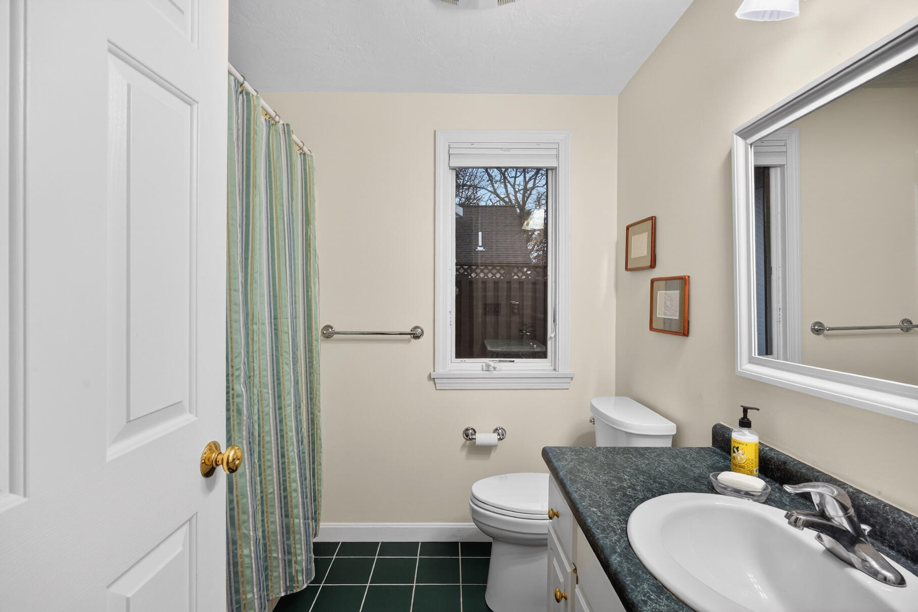 18 Windward Street, Unit 18 Mashpee, MA 02649 - Photo 21 of 34 a bathroom with a sink toilet and shower