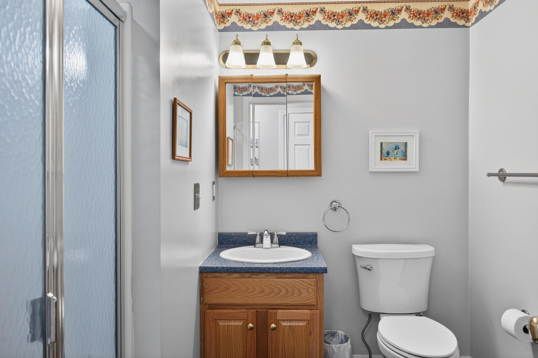 18 Windward Street, Unit 18 Mashpee, MA 02649 - Photo 24 of 34 a bathroom with a toilet and a sink