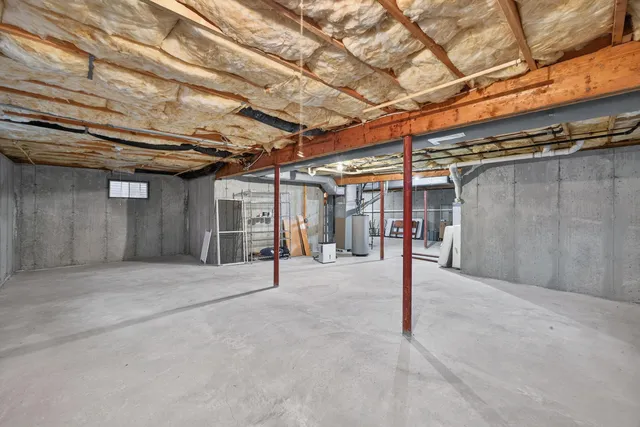 a view of a room with wooden walls
