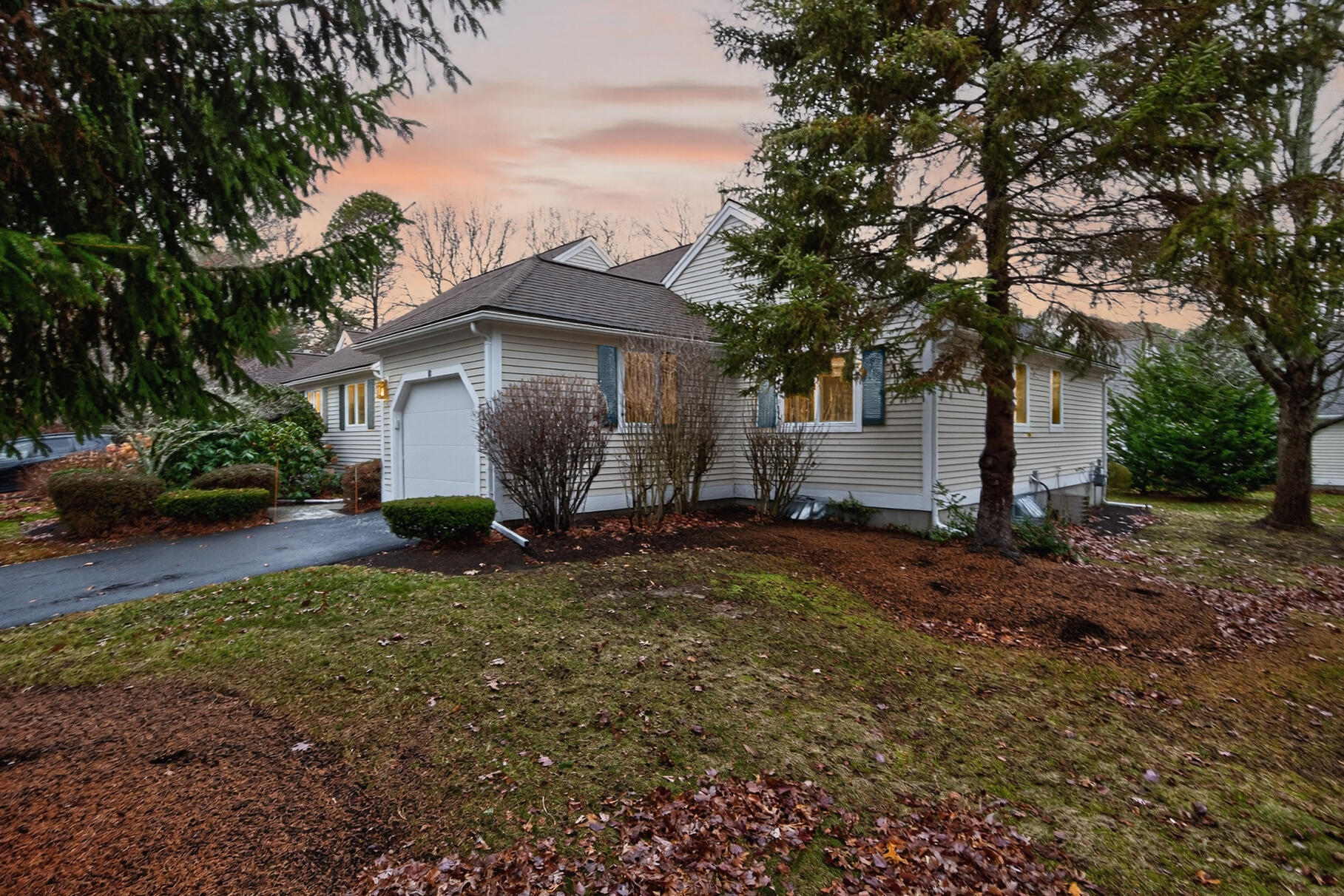 18 Windward Street, Unit 18 Mashpee, MA 02649 - Photo 31 of 34 a view of a house with backyard