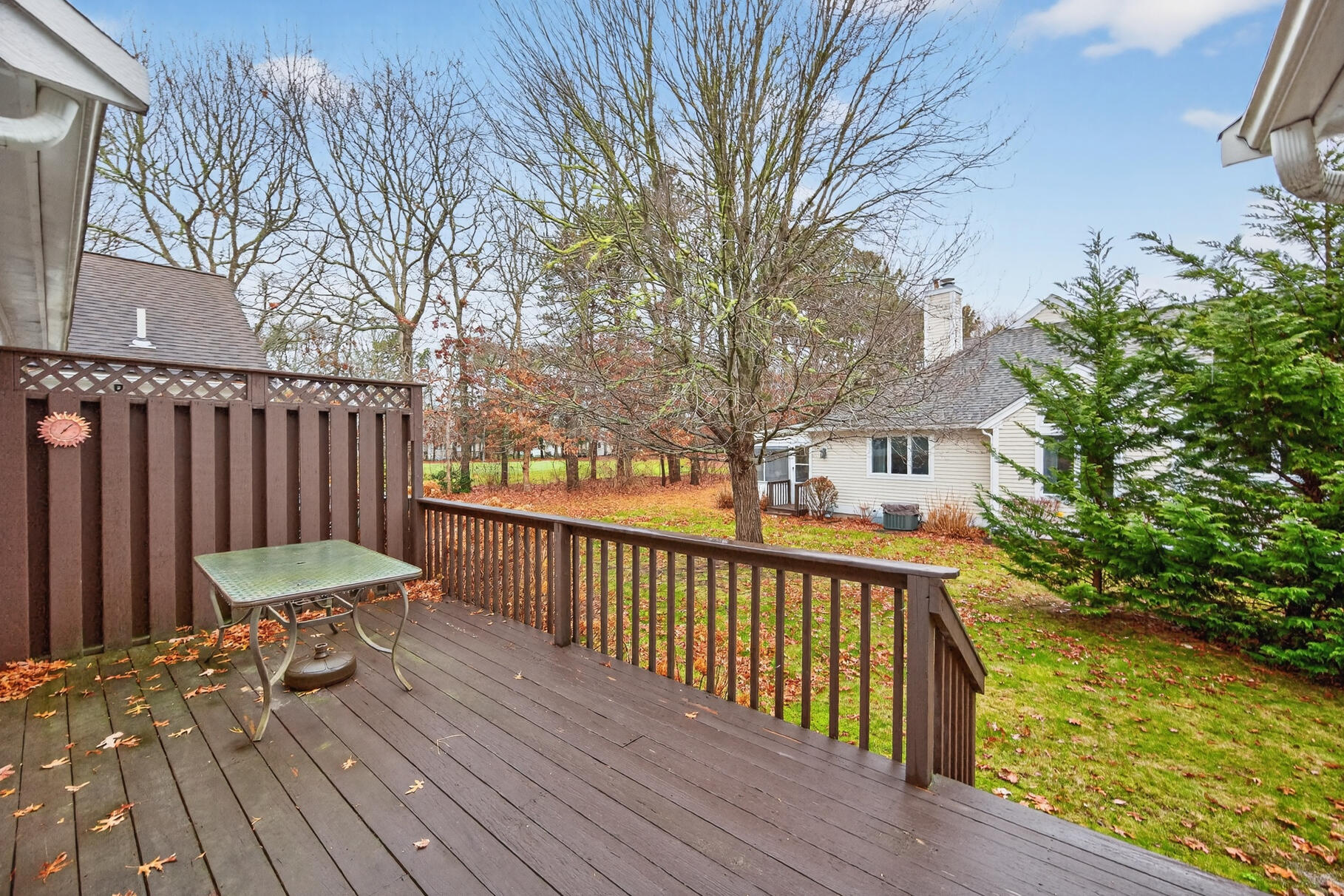 18 Windward Street, Unit 18 Mashpee, MA 02649 - Photo 6 of 34 a view of a two chairs on the roof deck