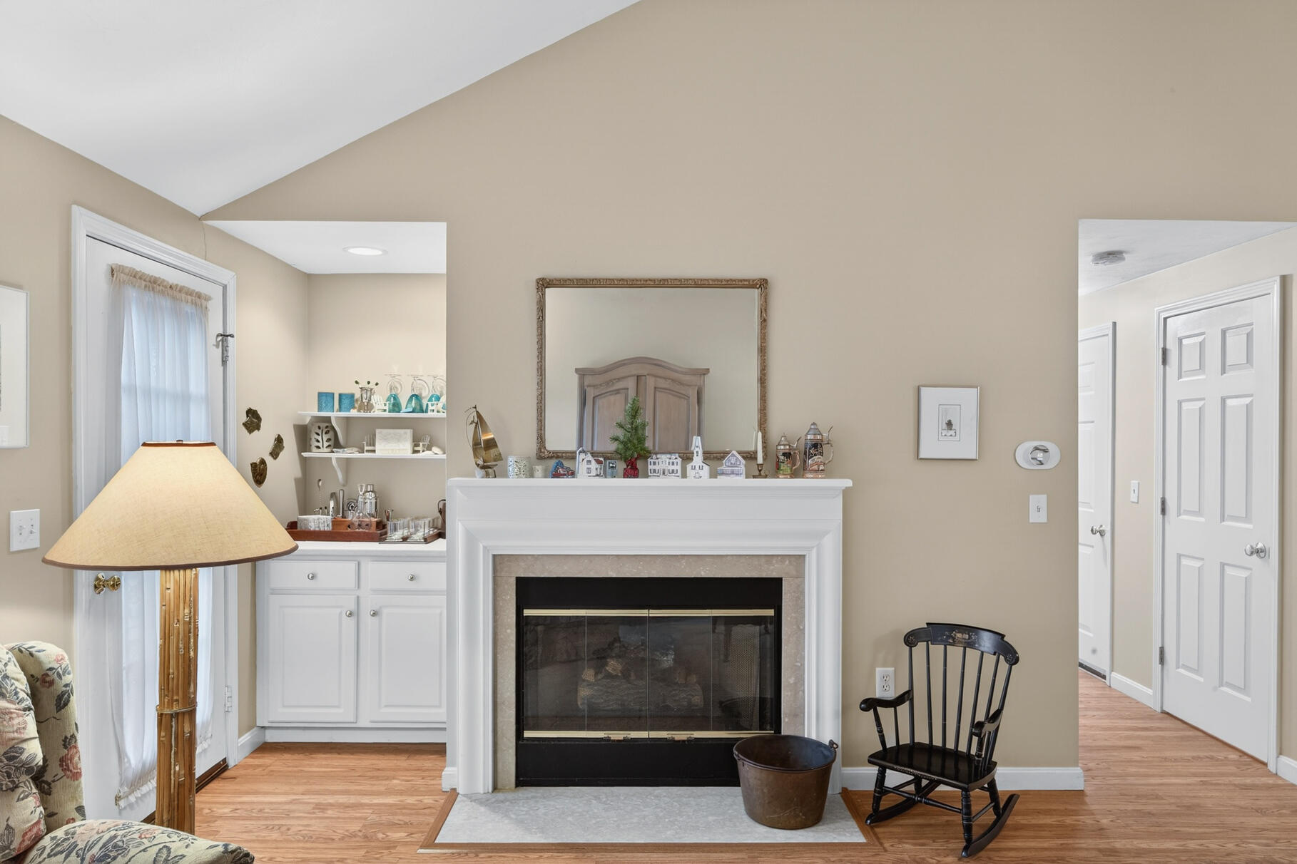 18 Windward Street, Unit 18 Mashpee, MA 02649 - Photo 9 of 34 a living room with furniture and a fireplace