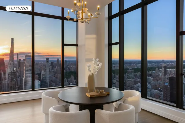 a view of a living room with furniture