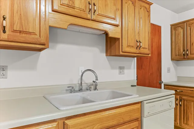 a view of hallway with livingroom