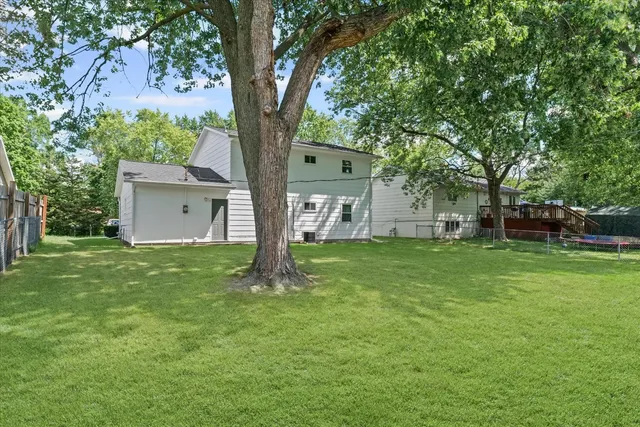 a view of a garden with trees