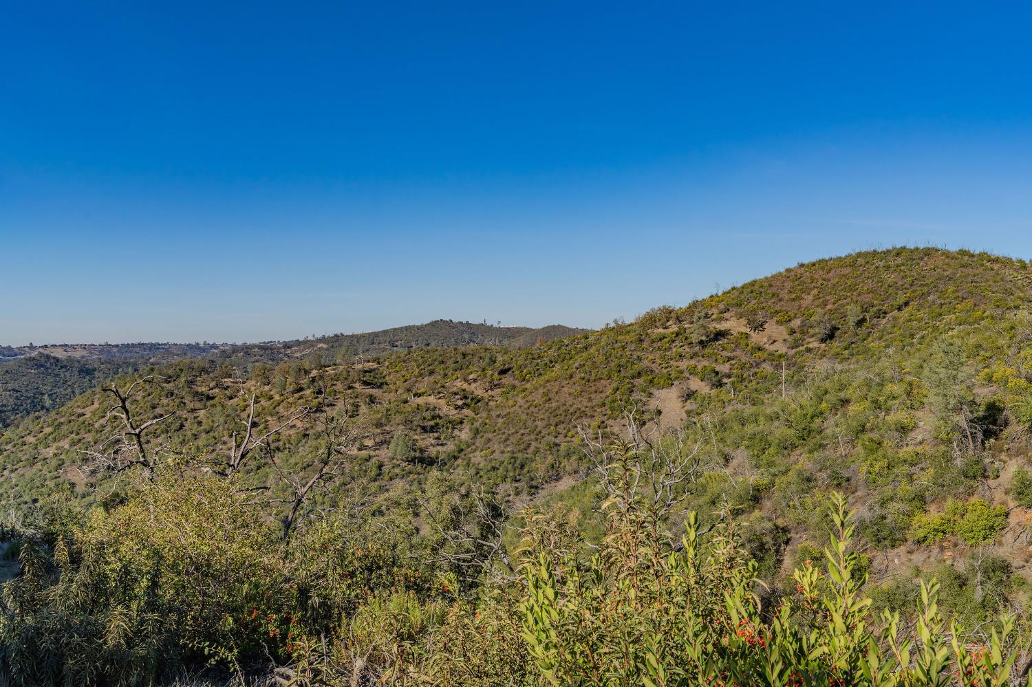 71 Hawver Road San Andreas, CA 95249 - Photo 25 of 96 a view of a large mountain with a mountain in the background