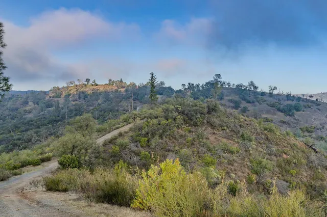 an aerial view of a tennis court