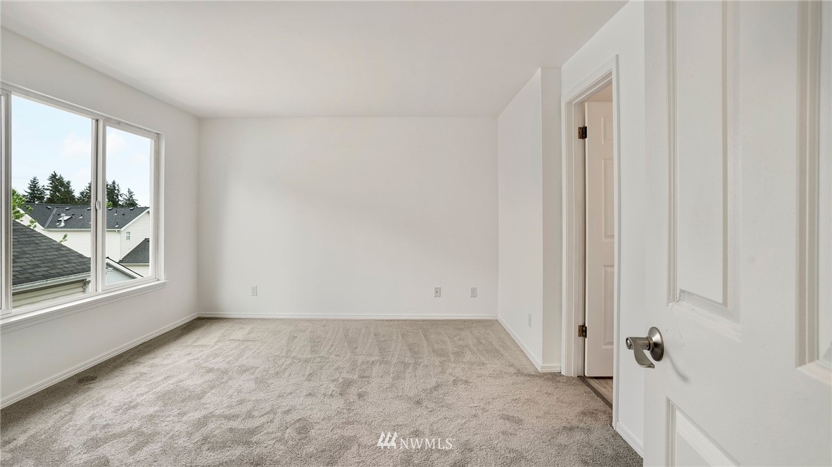 511 Redmond Place Northeast Renton, WA 98056 - Photo 17 of 31 an empty room with windows