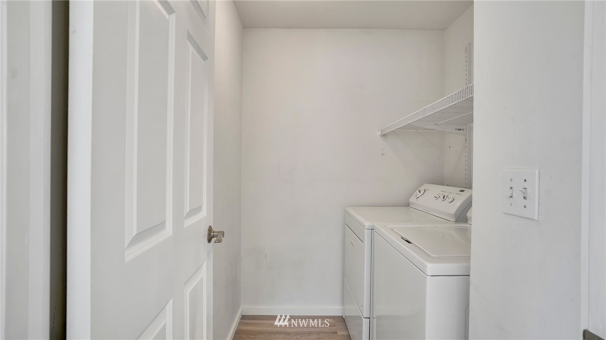 511 Redmond Place Northeast Renton, WA 98056 - Photo 23 of 31 a utility room with dryer and washer