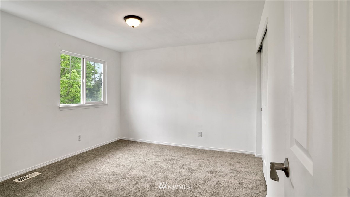 511 Redmond Place Northeast Renton, WA 98056 - Photo 24 of 31 a view of a room that has a window in it