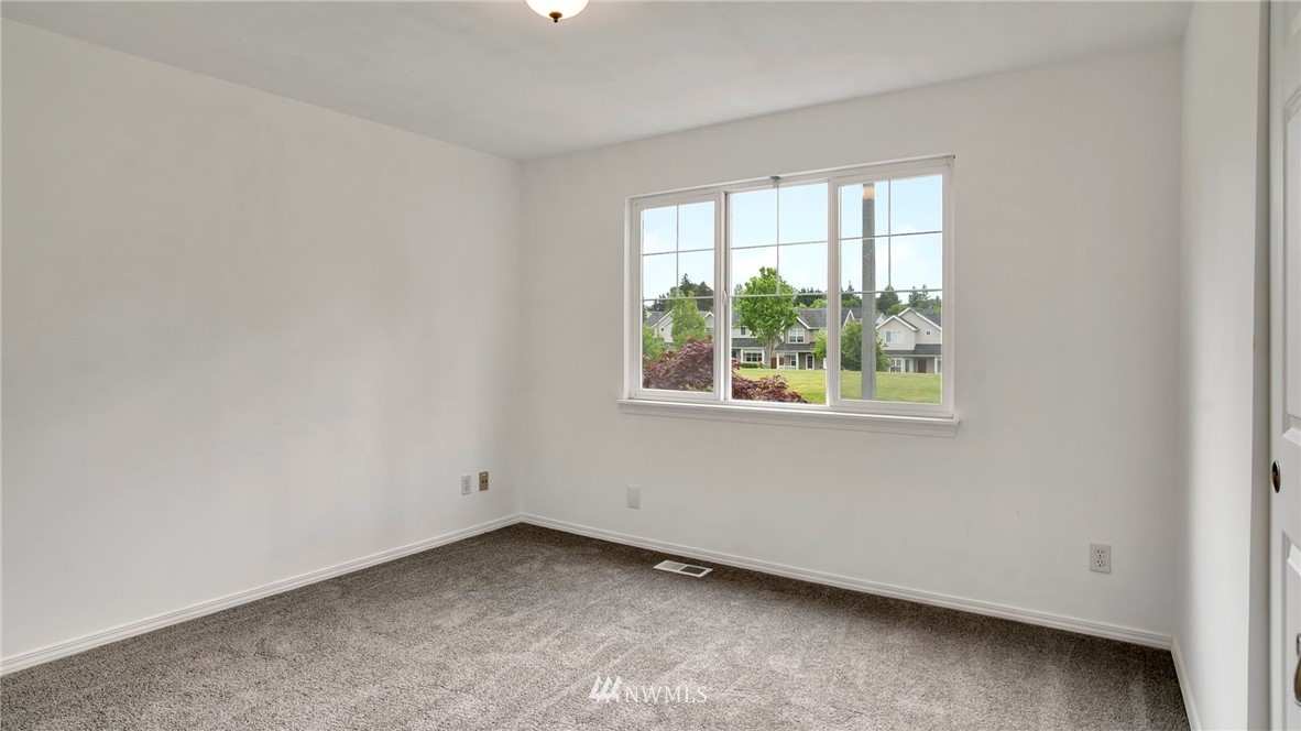 511 Redmond Place Northeast Renton, WA 98056 - Photo 26 of 31 an empty room with a window