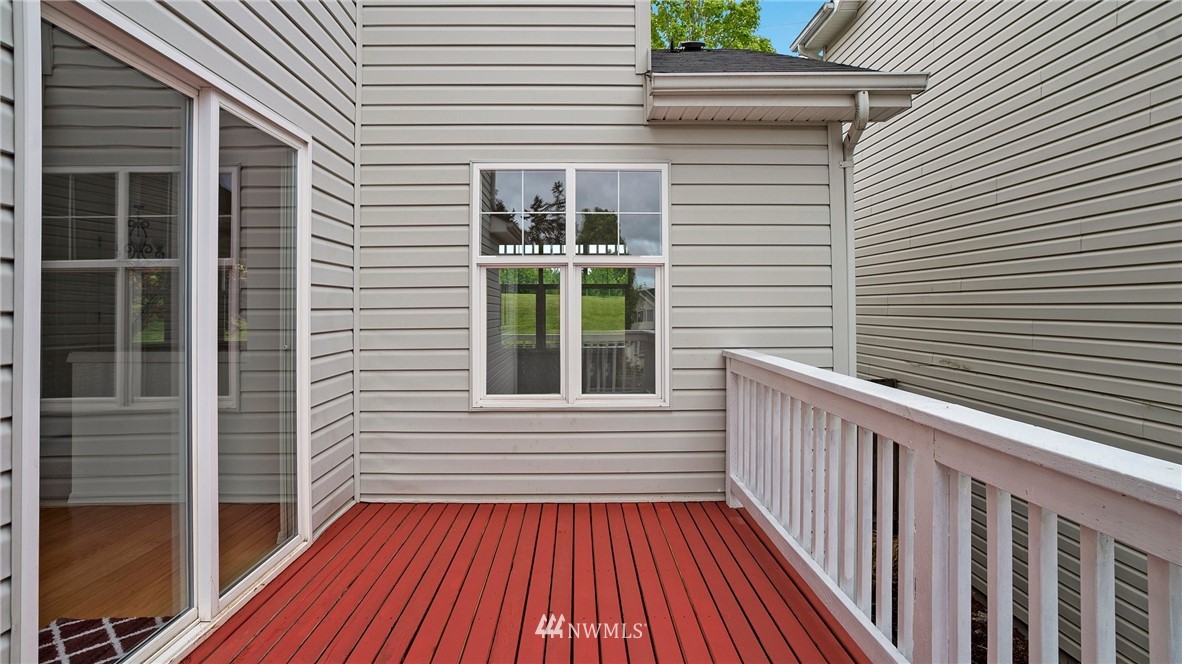 511 Redmond Place Northeast Renton, WA 98056 - Photo 27 of 31 a view of a balcony with wooden floor