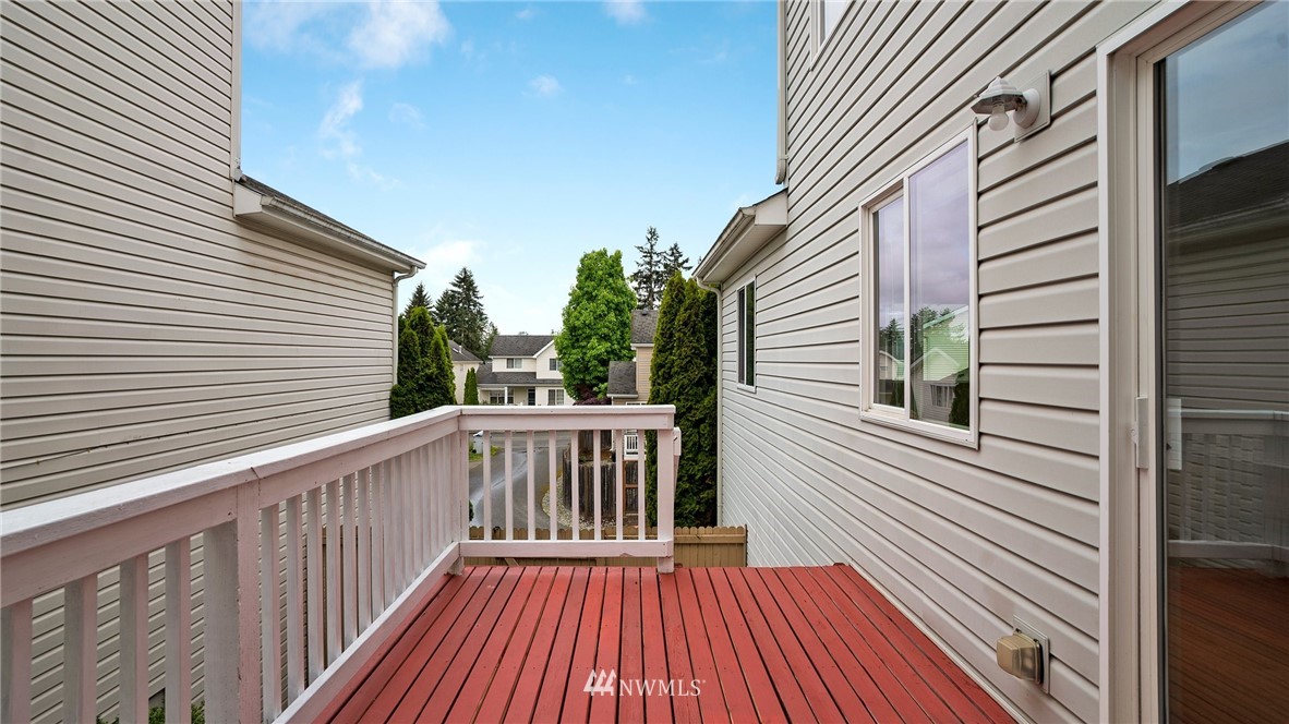 511 Redmond Place Northeast Renton, WA 98056 - Photo 28 of 31 a view of a wooden deck with large windows
