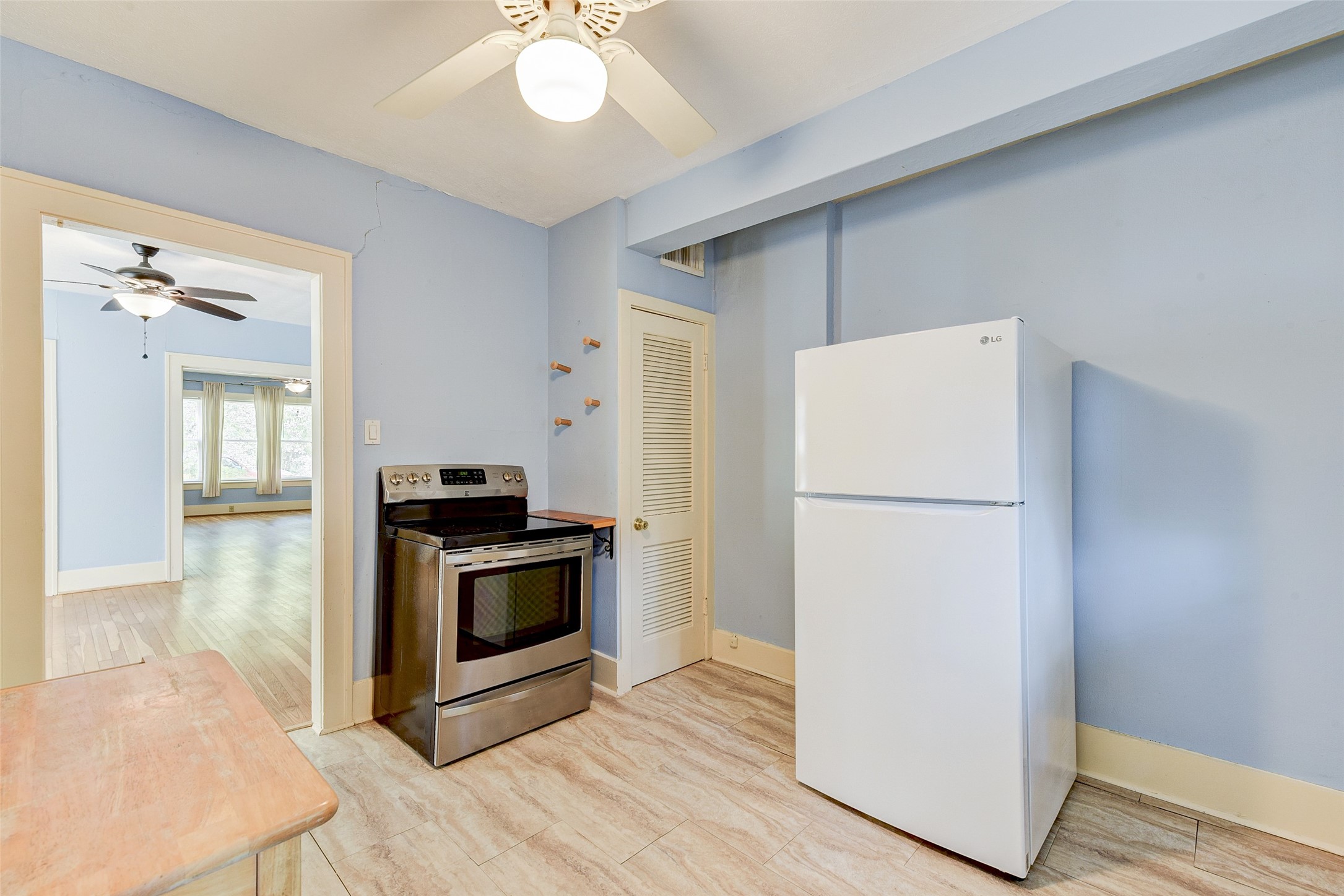 1737 Branard Street, Unit 1 Houston, TX 77098 - Photo 13 of 21 a kitchen with a refrigerator sink and stove