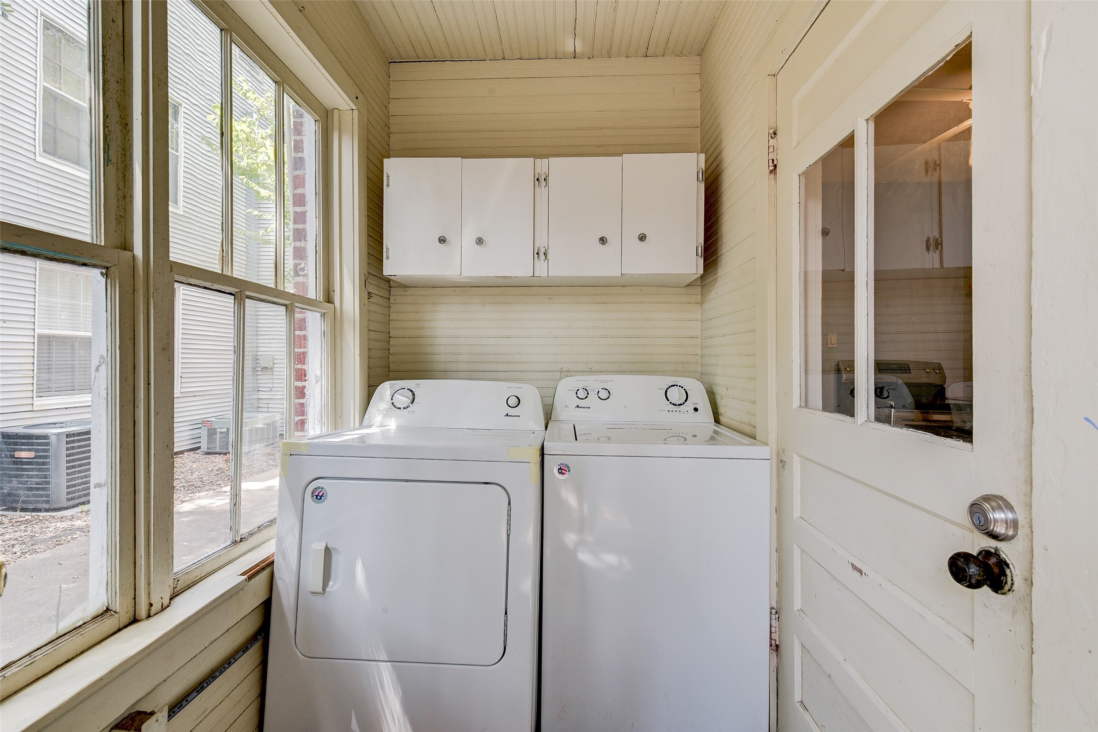 1737 Branard Street, Unit 1 Houston, TX 77098 - Photo 19 of 21 a utility room with dryer and washer