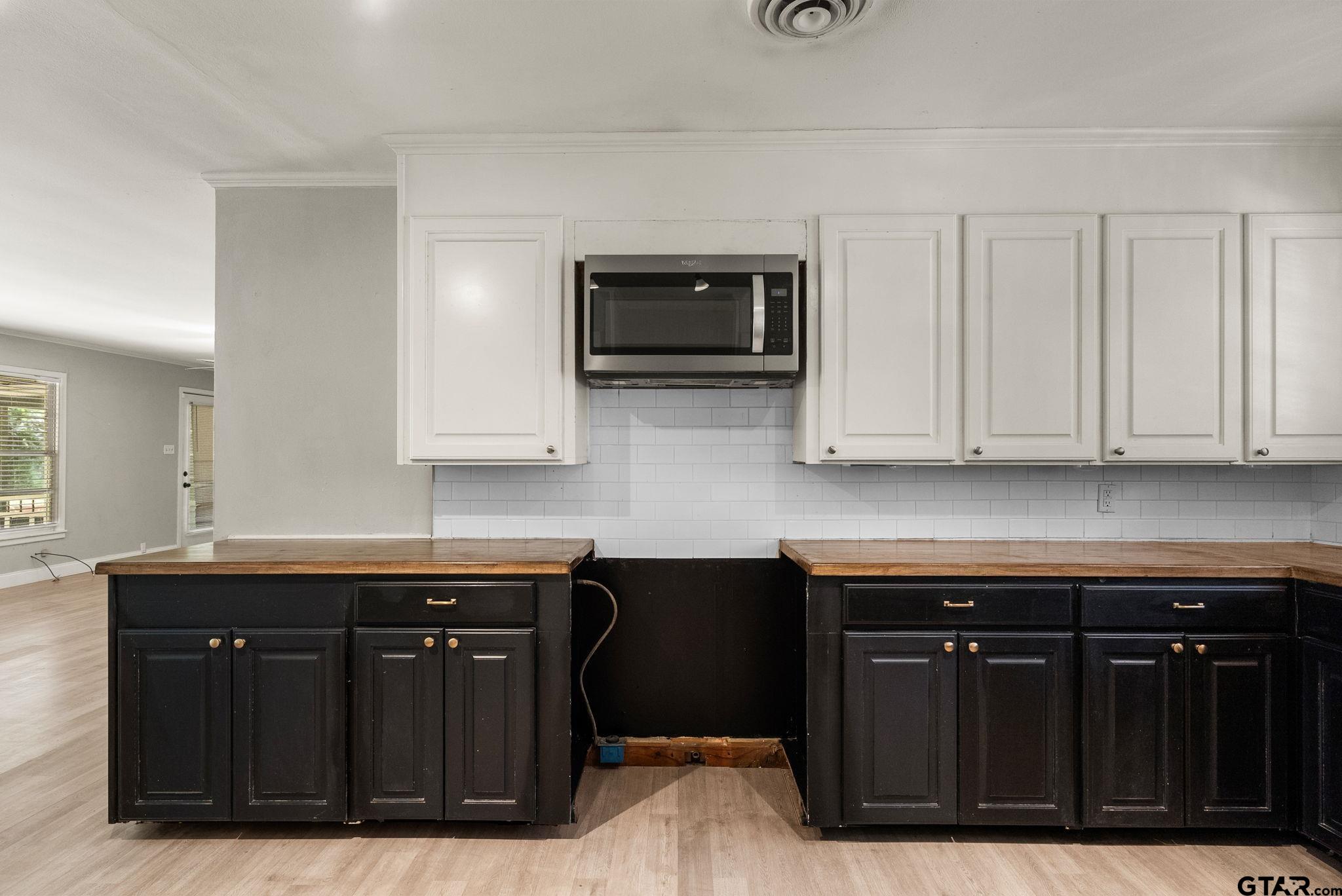 150 Wightman Lane Rusk, TX 75785 - Photo 11 of 38 a kitchen with stainless steel appliances granite countertop a cabinets and a sink