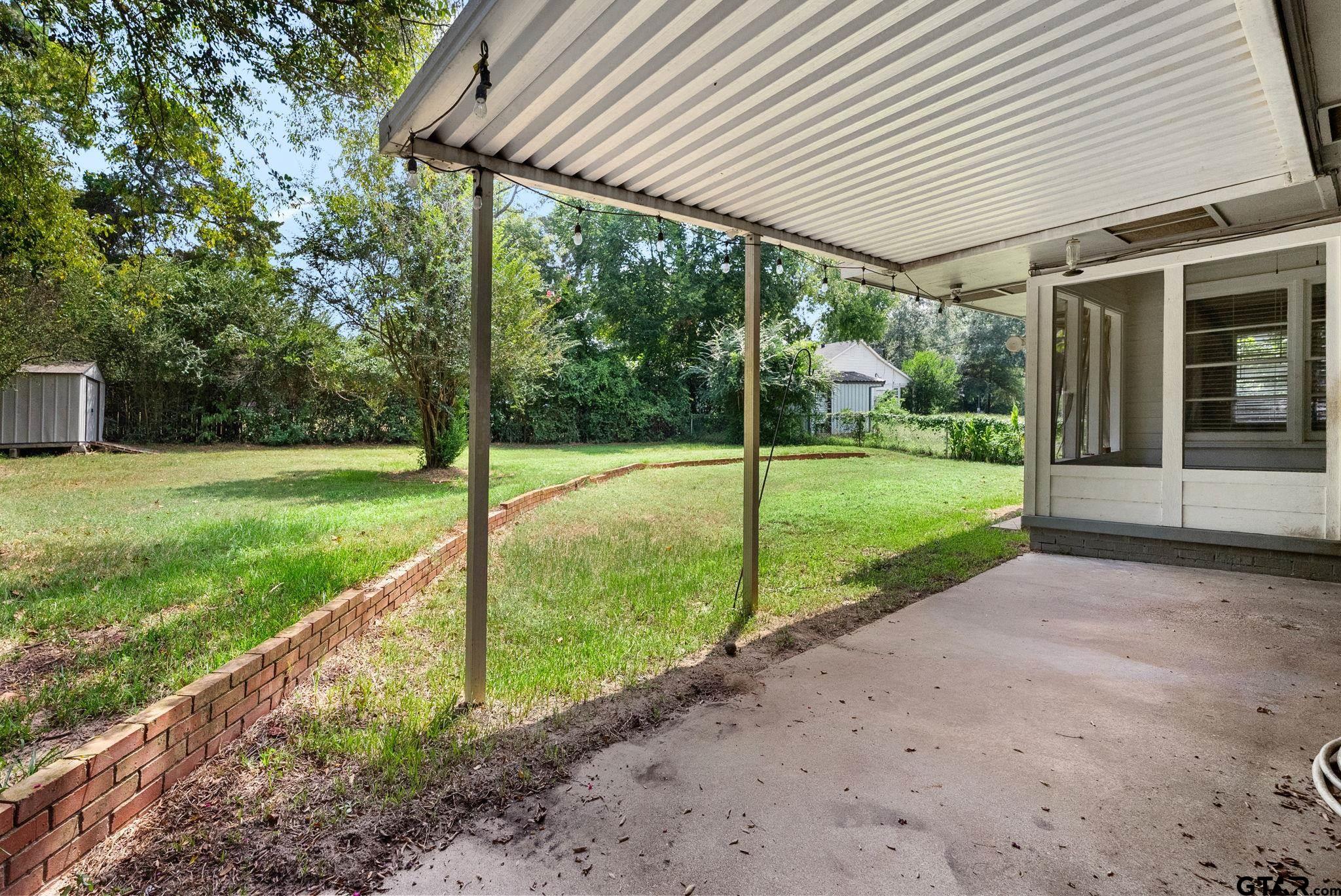 150 Wightman Lane Rusk, TX 75785 - Photo 27 of 38 a view of a backyard with plants and a backyard