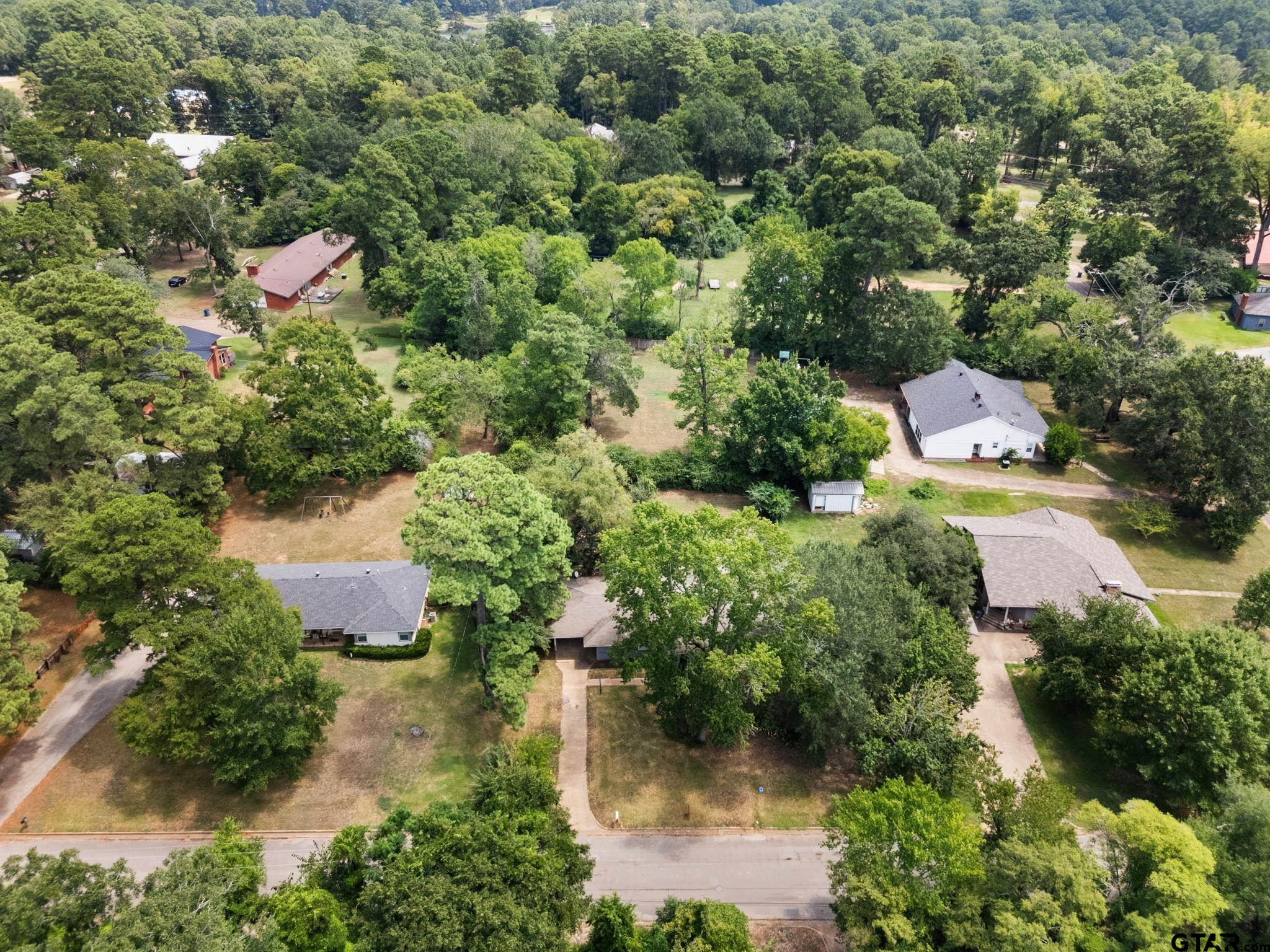 150 Wightman Lane Rusk, TX 75785 - Photo 36 of 38 an aerial view of residential house with outdoor space and trees all around