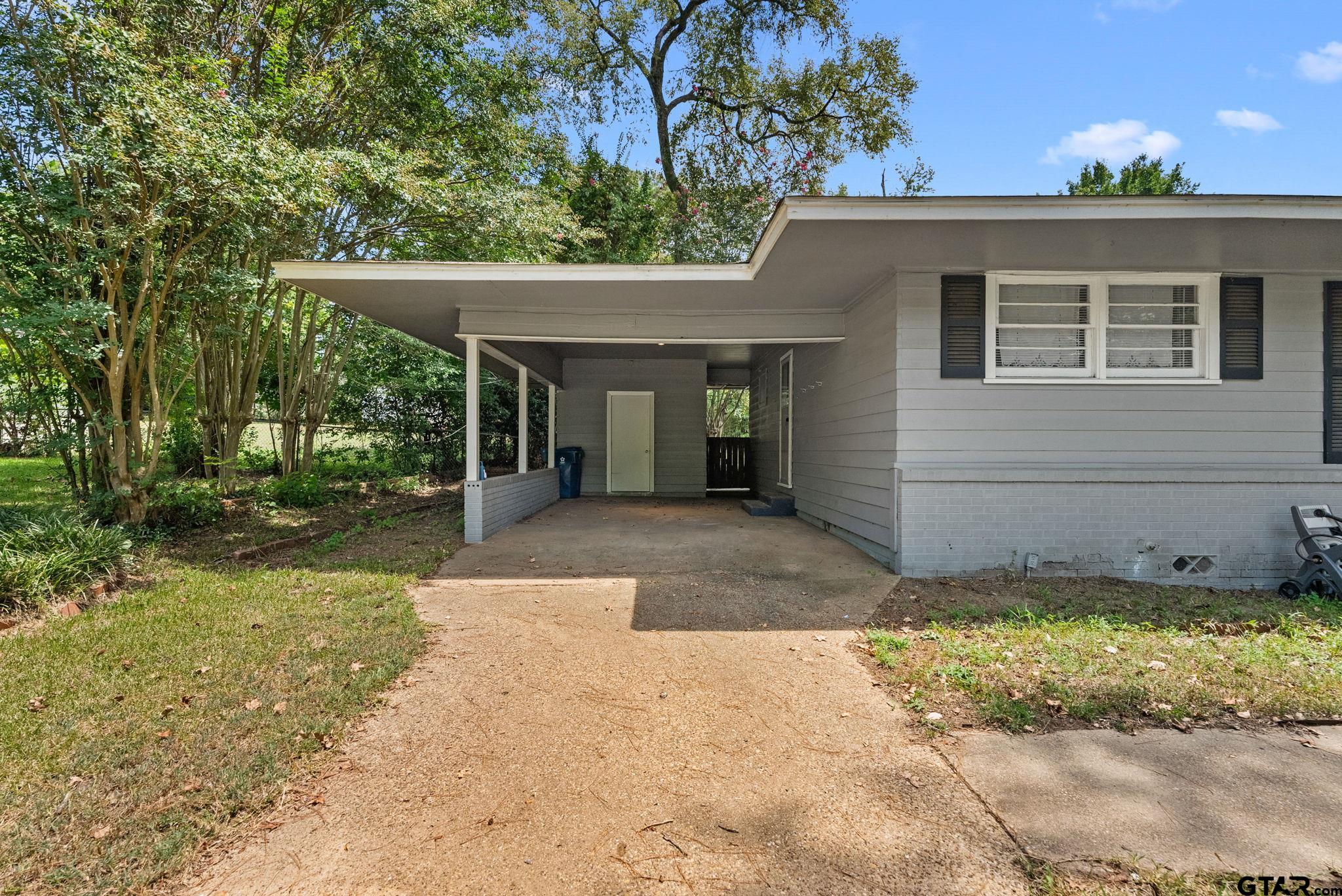 150 Wightman Lane Rusk, TX 75785 - Photo 37 of 38 a view of a house with a yard