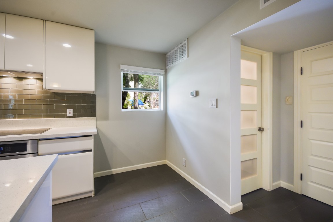 3110 Red River Street, Unit 201 Austin, TX 78705 - Photo 15 of 30 a view of hallway with a large window