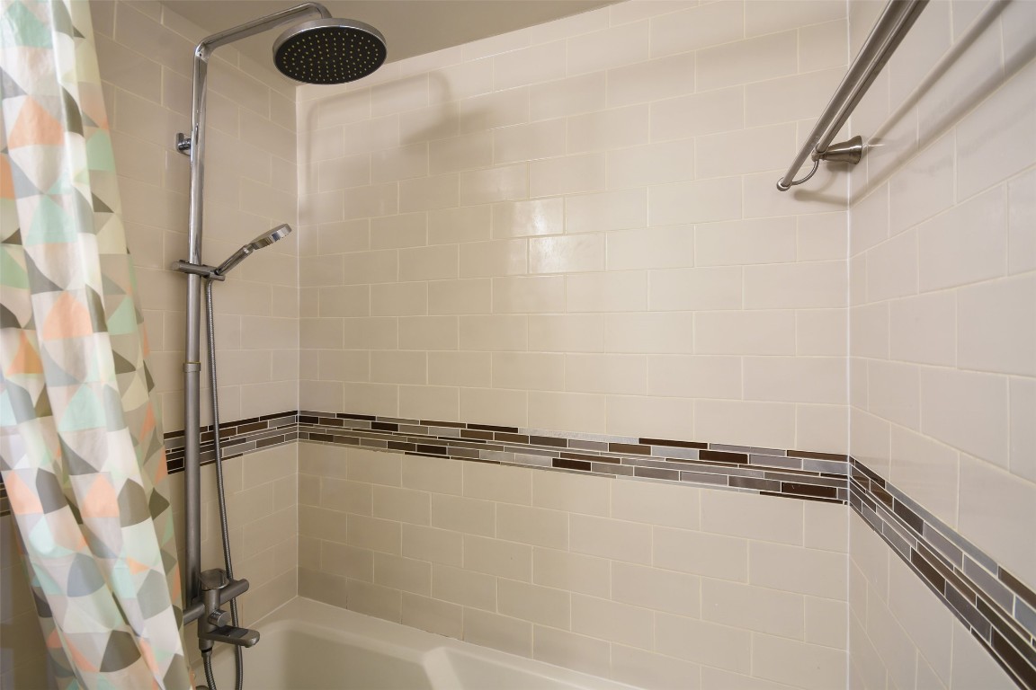 3110 Red River Street, Unit 201 Austin, TX 78705 - Photo 23 of 30 a close up of a bathtub