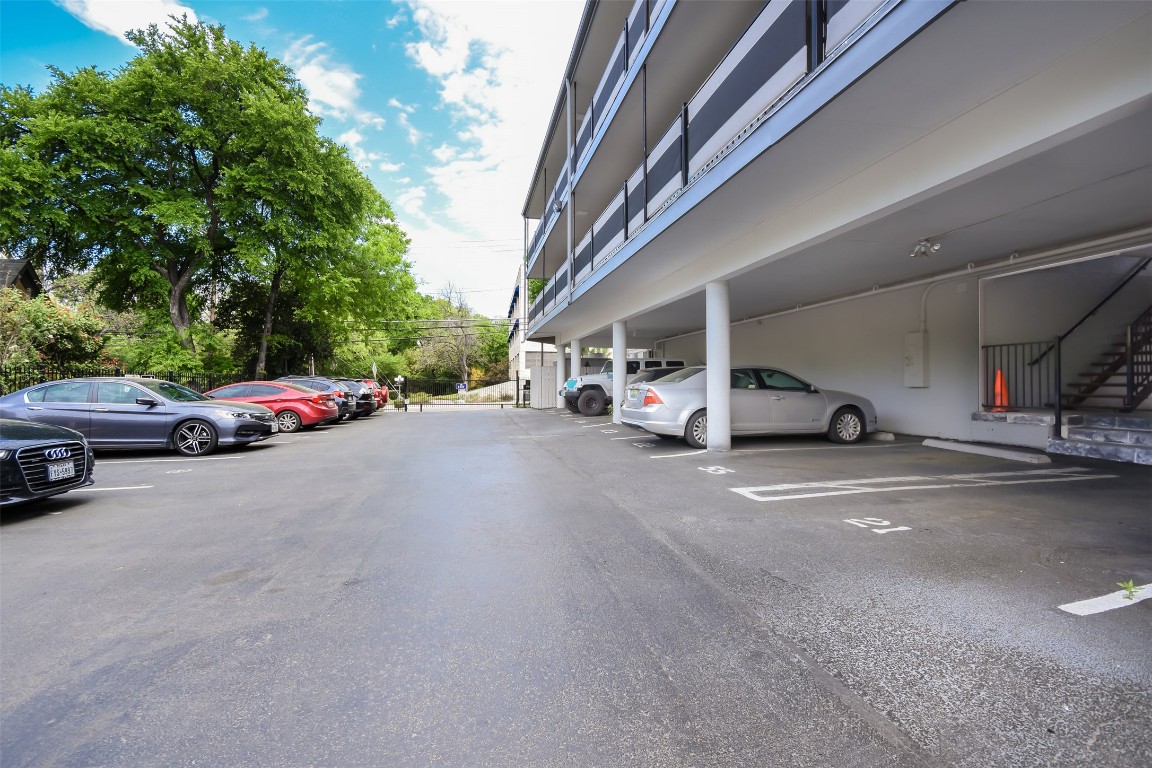 3110 Red River Street, Unit 201 Austin, TX 78705 - Photo 28 of 30 a car parked on the side of a street