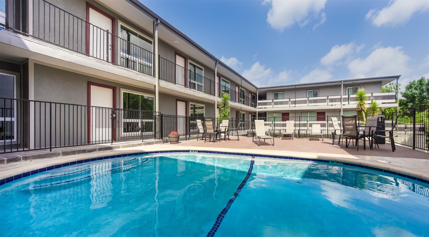 3110 Red River Street, Unit 201 Austin, TX 78705 - Photo 29 of 30 a view of a swimming pool with outdoor seating