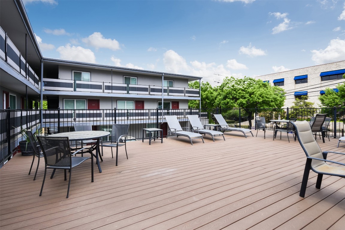 3110 Red River Street, Unit 201 Austin, TX 78705 - Photo 5 of 30 a view of a dining room with furniture and wooden floor