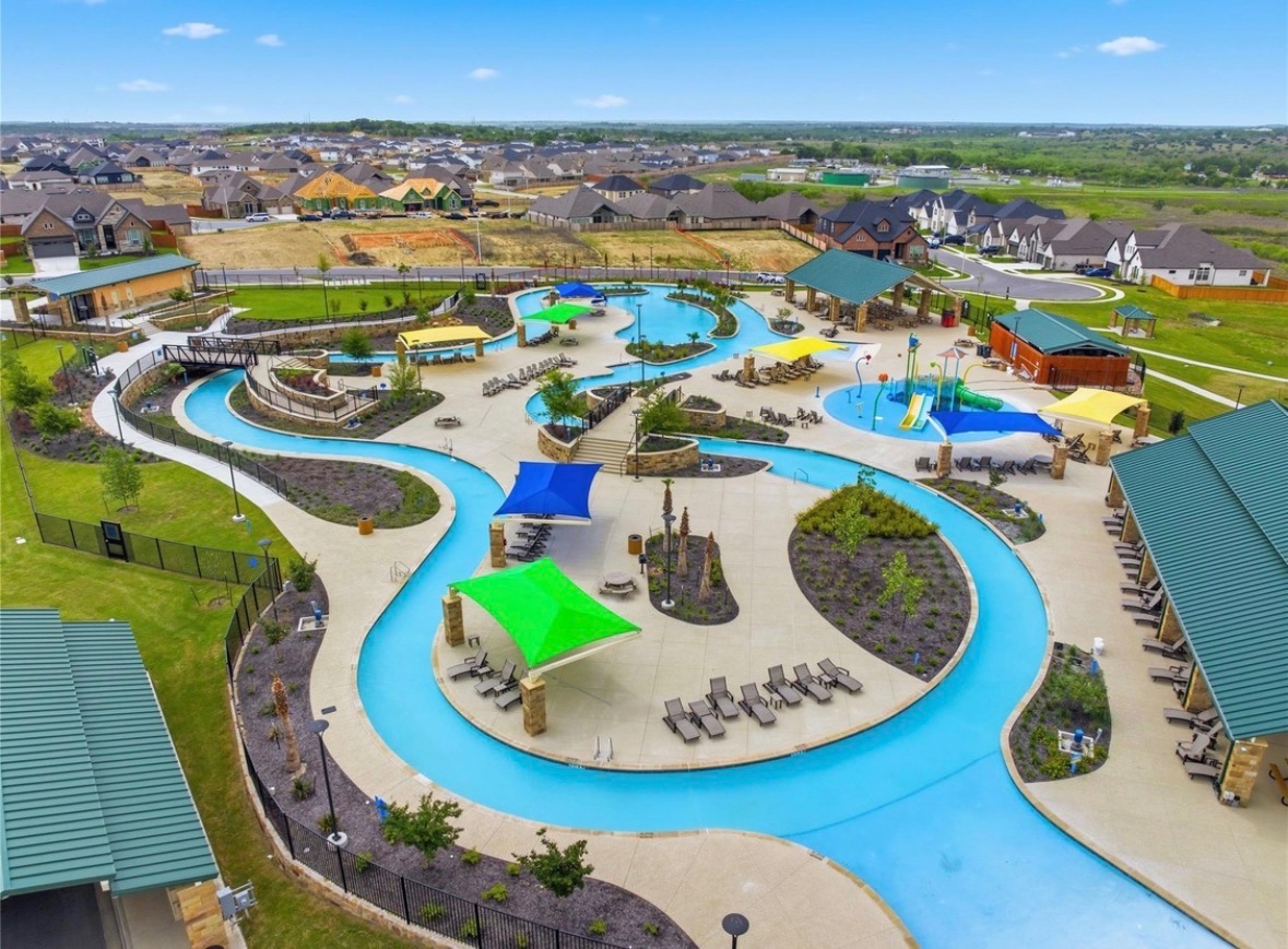 544 Cherrystone Loop Buda, TX 78610 - Photo 39 of 40 an aerial view of a swimming pool with outdoor seating