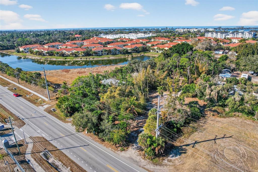 14 Old Venice Road Osprey, FL 34229 - Photo 13 of 20 a view of a lake with a house in the background