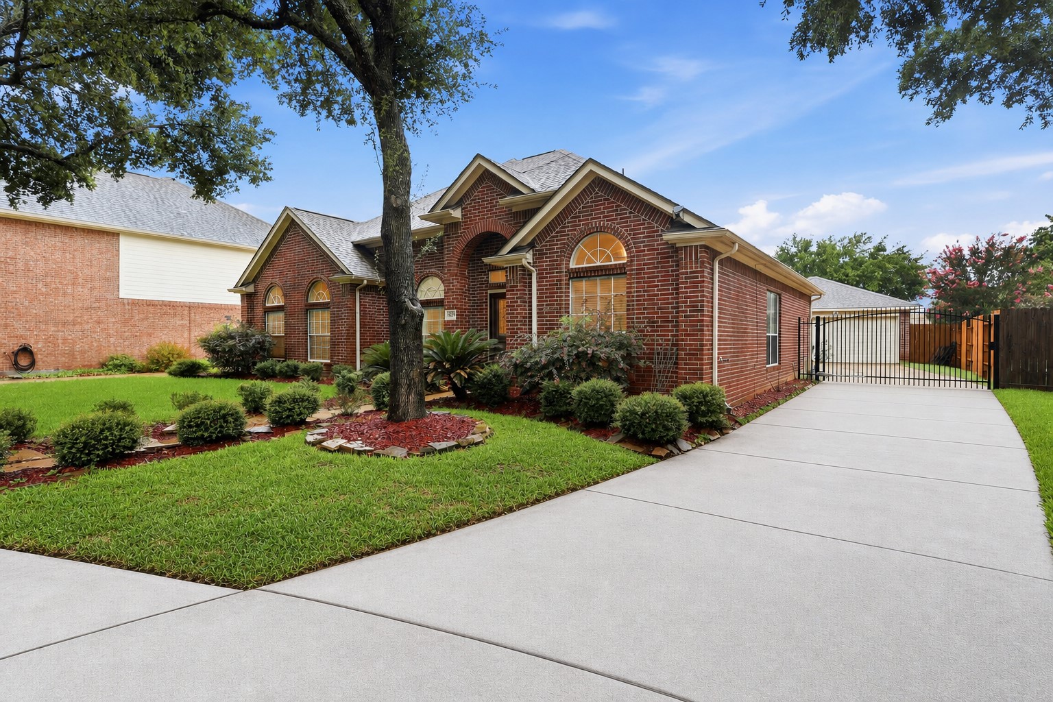 5815 Pheasant Ridge Lane Houston, TX 77041 - Photo 2 of 43 This dramatic all-brick one-story ranch home features exceptionally long driveways, providing abundant parking for family, guests, and entertaining. An automatic gated entrance welcomes you home and opens to a detached 2½-car garage, offering both privacy and convenience. The impressive curb appeal, expansive parking areas, and secure gated access make this property truly stand out from the rest.