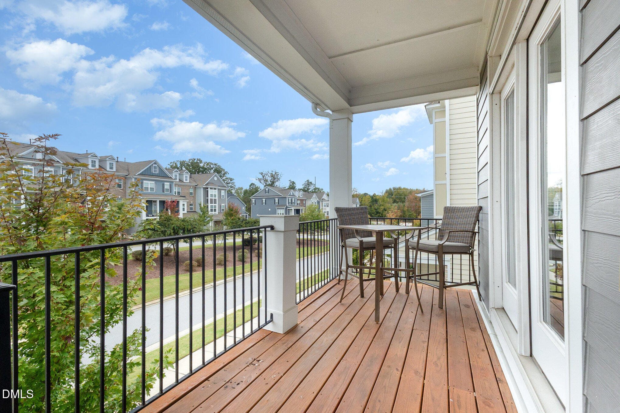 2906 Great Lawn Road Apex, NC 27502 - Photo 12 of 41 a view of a balcony with wooden floor