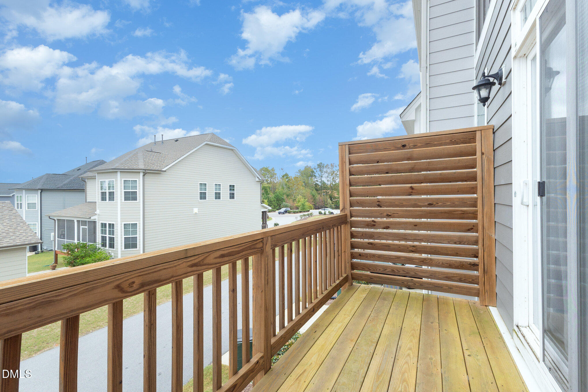 2906 Great Lawn Road Apex, NC 27502 - Photo 19 of 41 a view of a balcony with wooden floor and fence