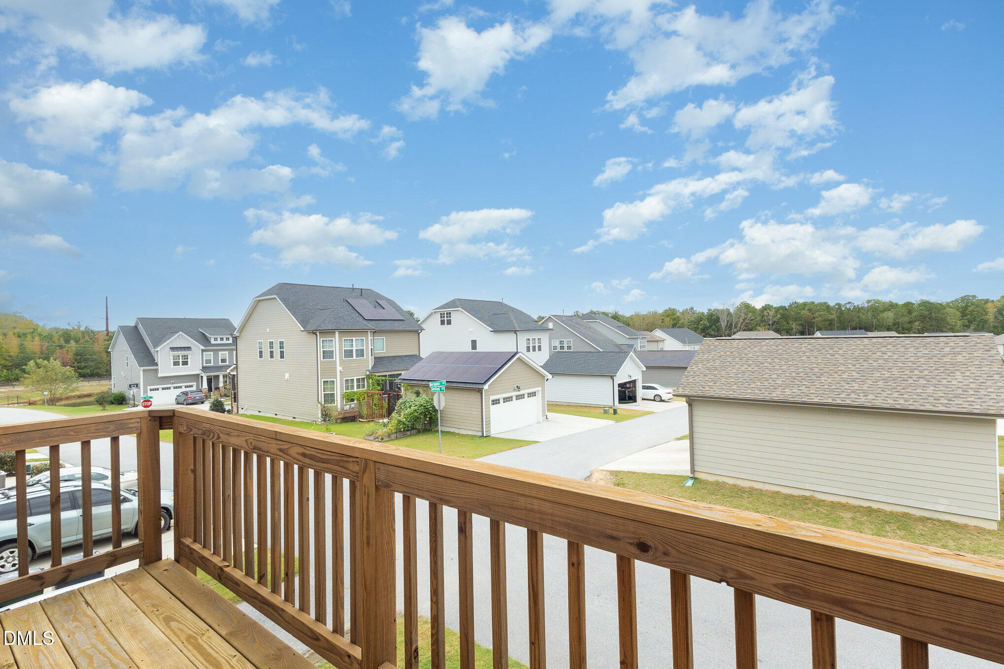 2906 Great Lawn Road Apex, NC 27502 - Photo 20 of 41 a view of a city from a balcony