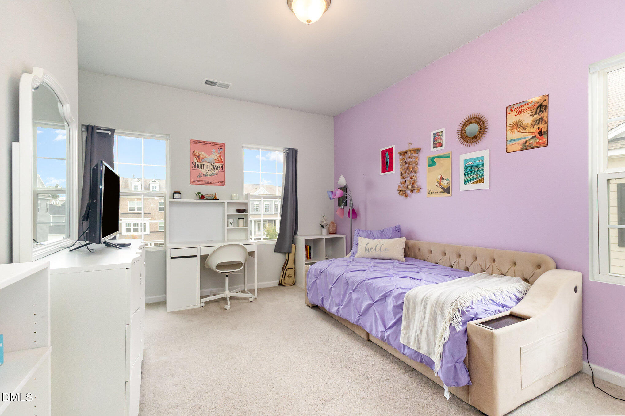 2906 Great Lawn Road Apex, NC 27502 - Photo 27 of 41 a bedroom with a bed and a flat screen tv