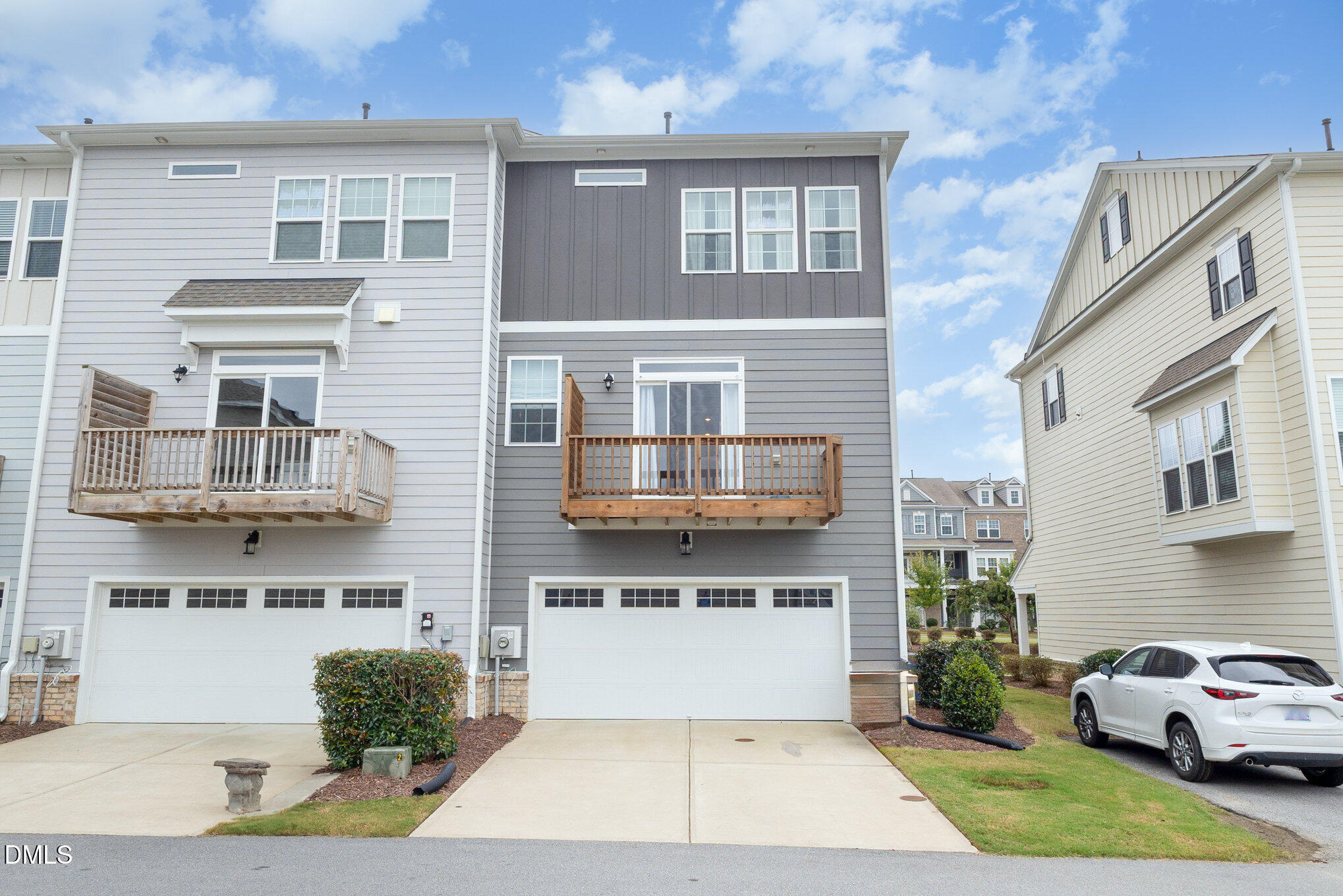 2906 Great Lawn Road Apex, NC 27502 - Photo 33 of 41 a view of a building and car parked