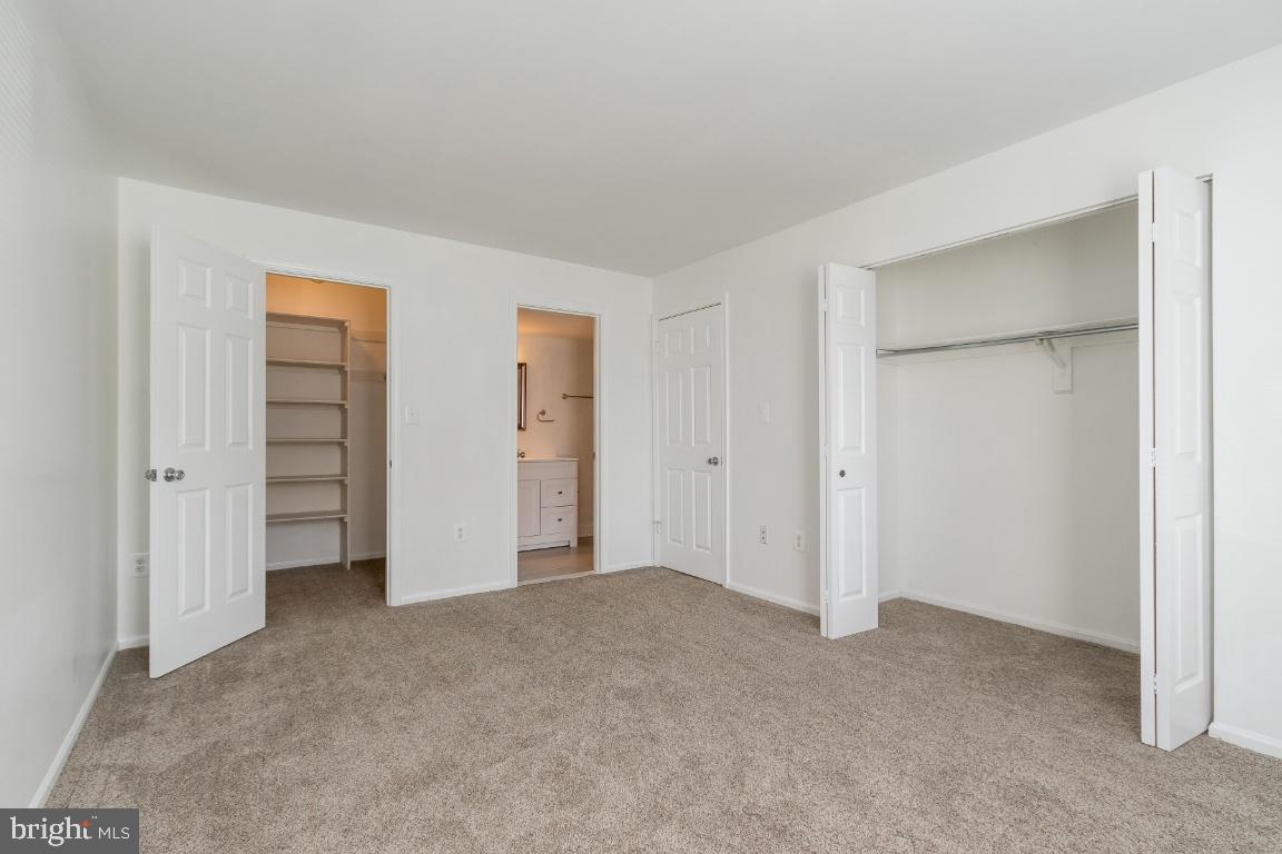 9565 Battery Heights Boulevard, Unit 101 Manassas, VA 20110 - Photo 24 of 32 SPACIOUS BEDROOM W/2 CLOSETS