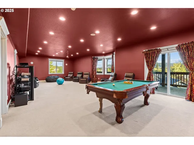 a room with furniture and gym equipment