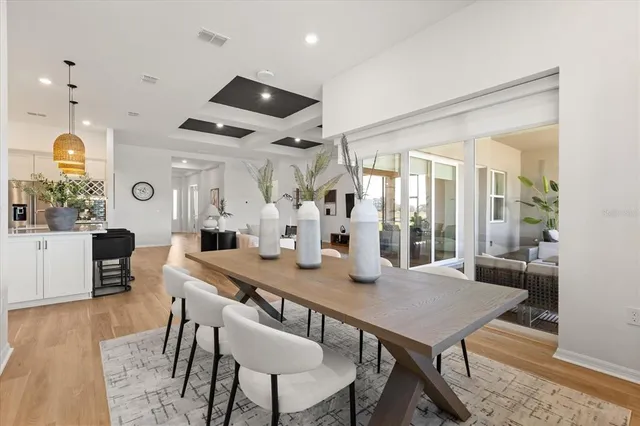 a room with gym equipment and a view of living room